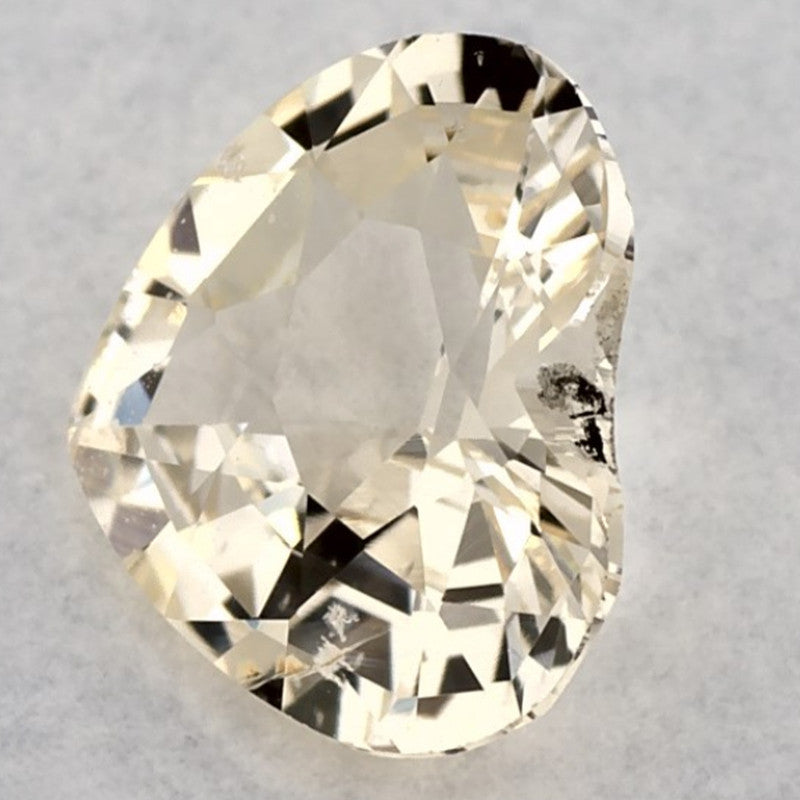 0.79 Carat Heart Natural Yellow Sapphire